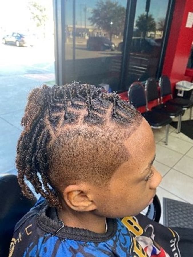 La Escena de Aseo Masculino de Fort Worth se Eleva con la Expansión del Salón Fade and Braid de Herbert Fisher